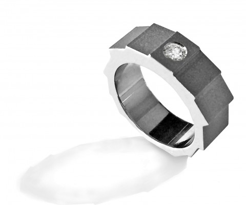 
	Custom ring natural titanium and 10 points diamond
